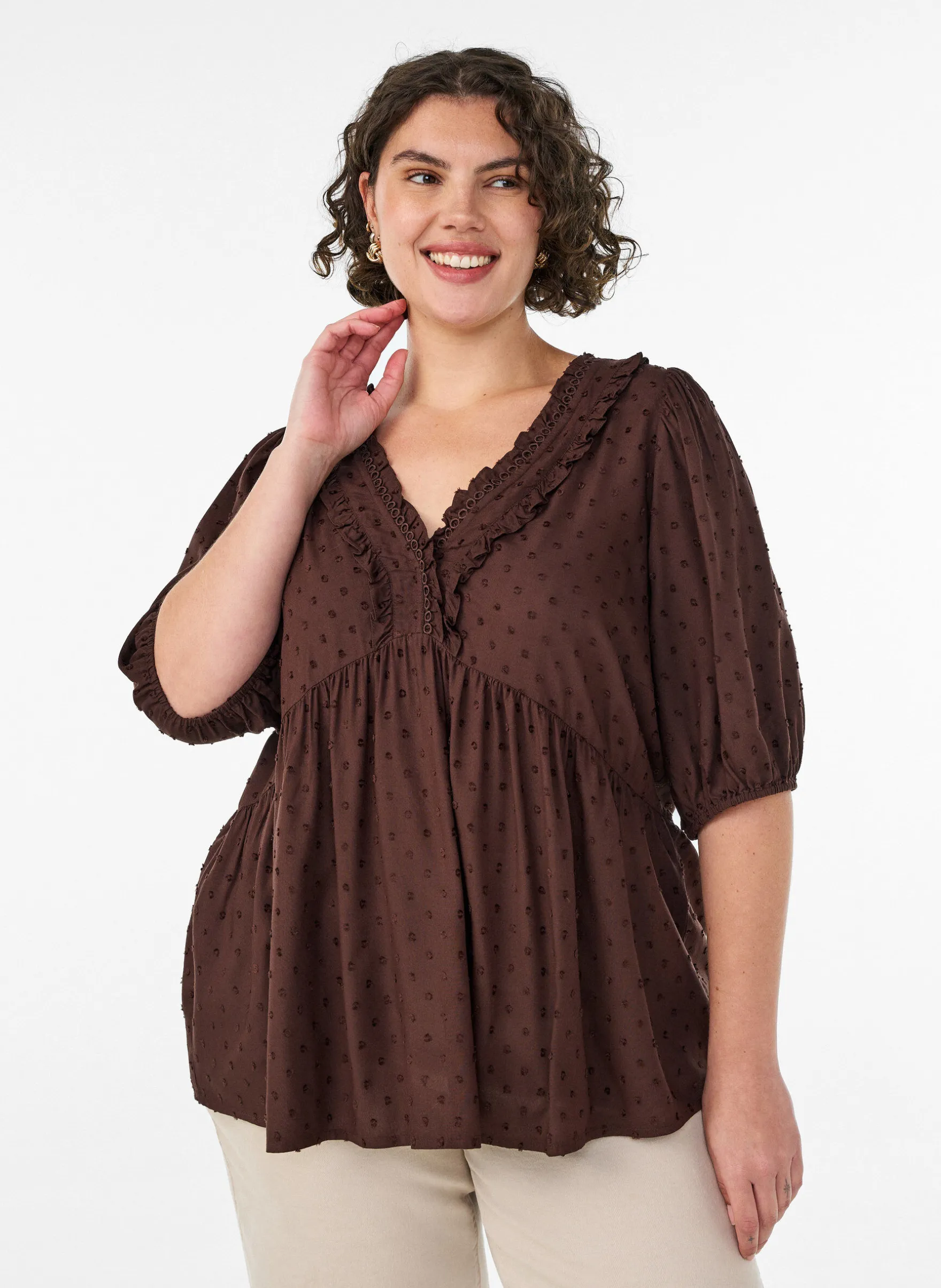 Bluse aus Viskose mit gepunkteter Struktur und V-Ausschnitt