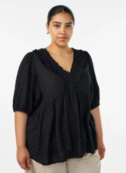 Bluse aus Viskose mit gepunkteter Struktur und V-Ausschnitt