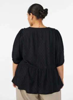 Bluse aus Viskose mit gepunkteter Struktur und V-Ausschnitt
