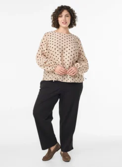 Bluse mit Punkten und Bindedetails