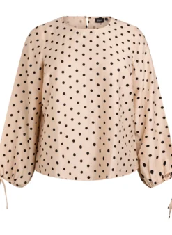 Bluse mit Punkten und Bindedetails