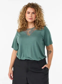 Bluse mit Spitzeneinsatz und Ballonärmeln