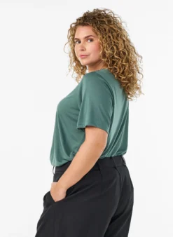 Bluse mit Spitzeneinsatz und Ballonärmeln