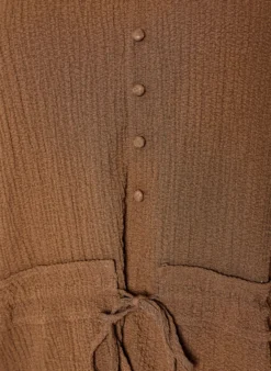 Bluse mit Struktur und Taillenbindung