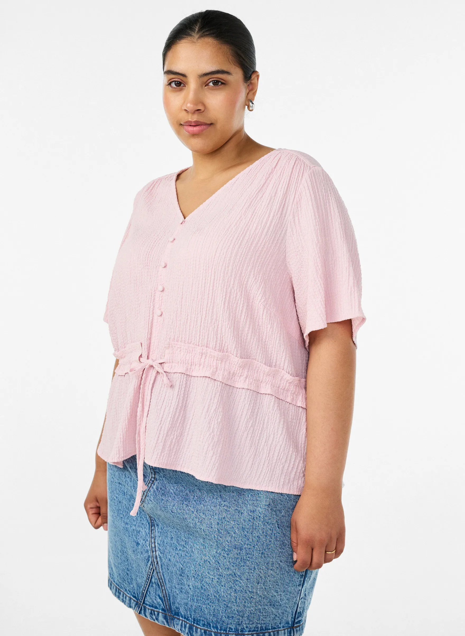 Bluse mit Struktur und Taillenbindung