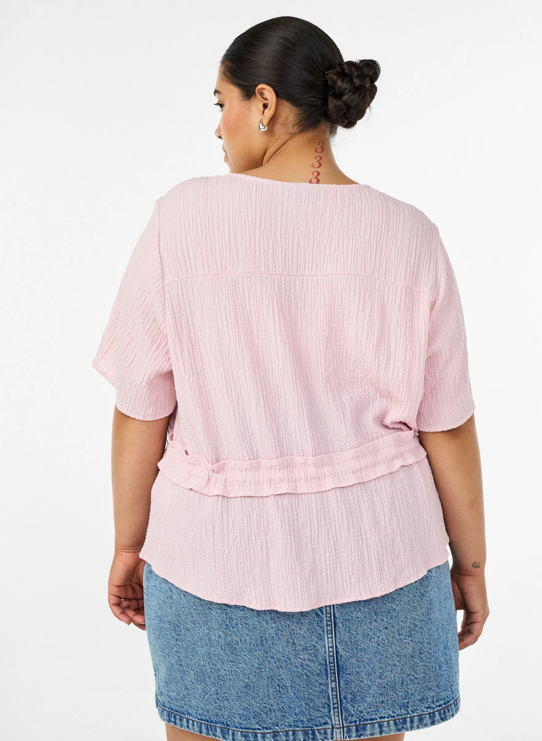 Bluse mit Struktur und Taillenbindung