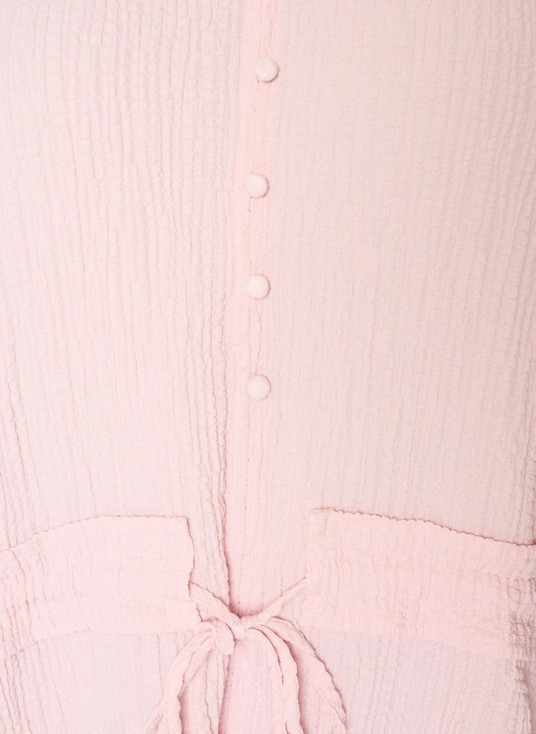 Bluse mit Struktur und Taillenbindung