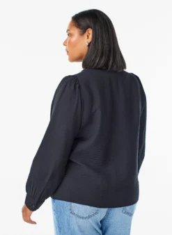 Bluse mit V-Ausschnitt und bestickten Bändern