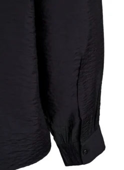 Bluse mit V-Ausschnitt und bestickten Bändern