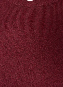 Gestricktes Minikleid mit gewelltem Saum und Schlitzen