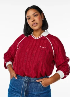 Jerseybluse mit Struktur und Kontrastdetails
