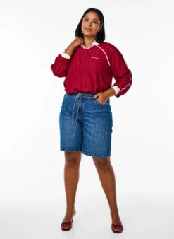 Jerseybluse mit Struktur und Kontrastdetails