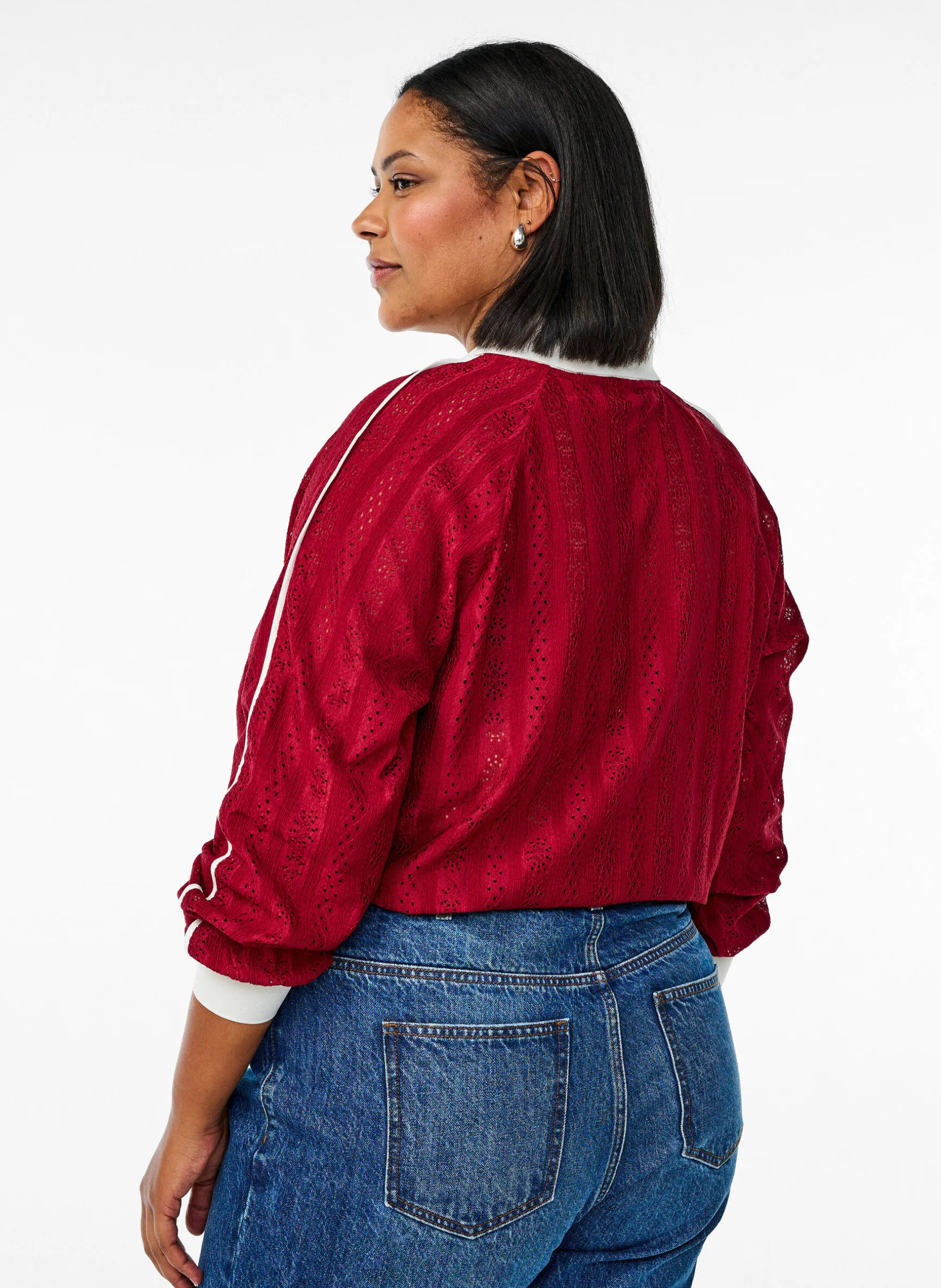 Jerseybluse mit Struktur und Kontrastdetails