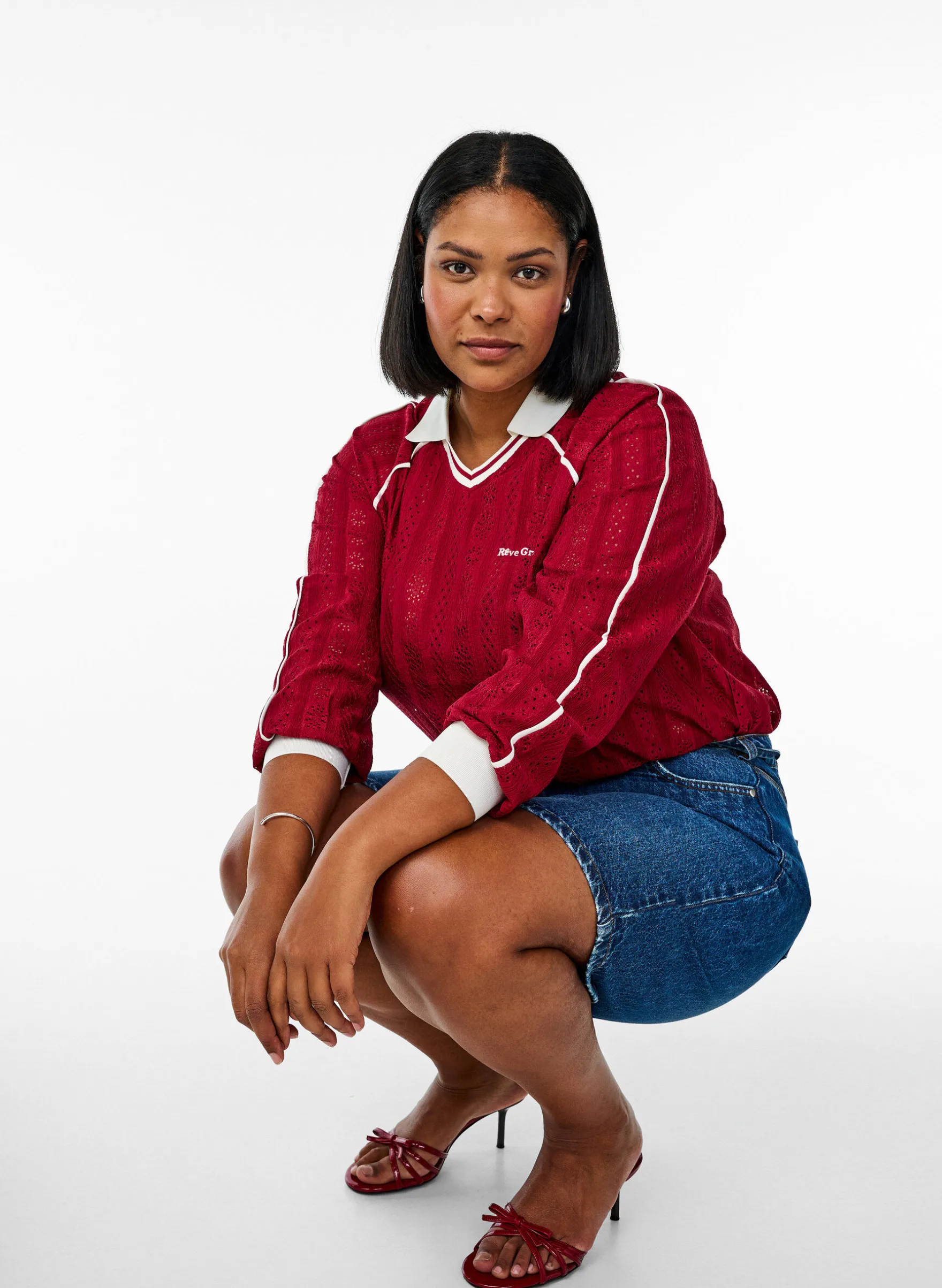 Jerseybluse mit Struktur und Kontrastdetails
