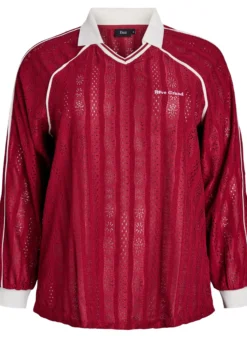 Jerseybluse mit Struktur und Kontrastdetails