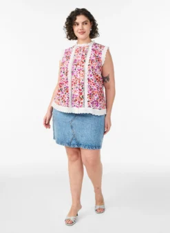 Ärmellose Bluse aus Baumwolle mit Blumenprint und Broderie Anglaise