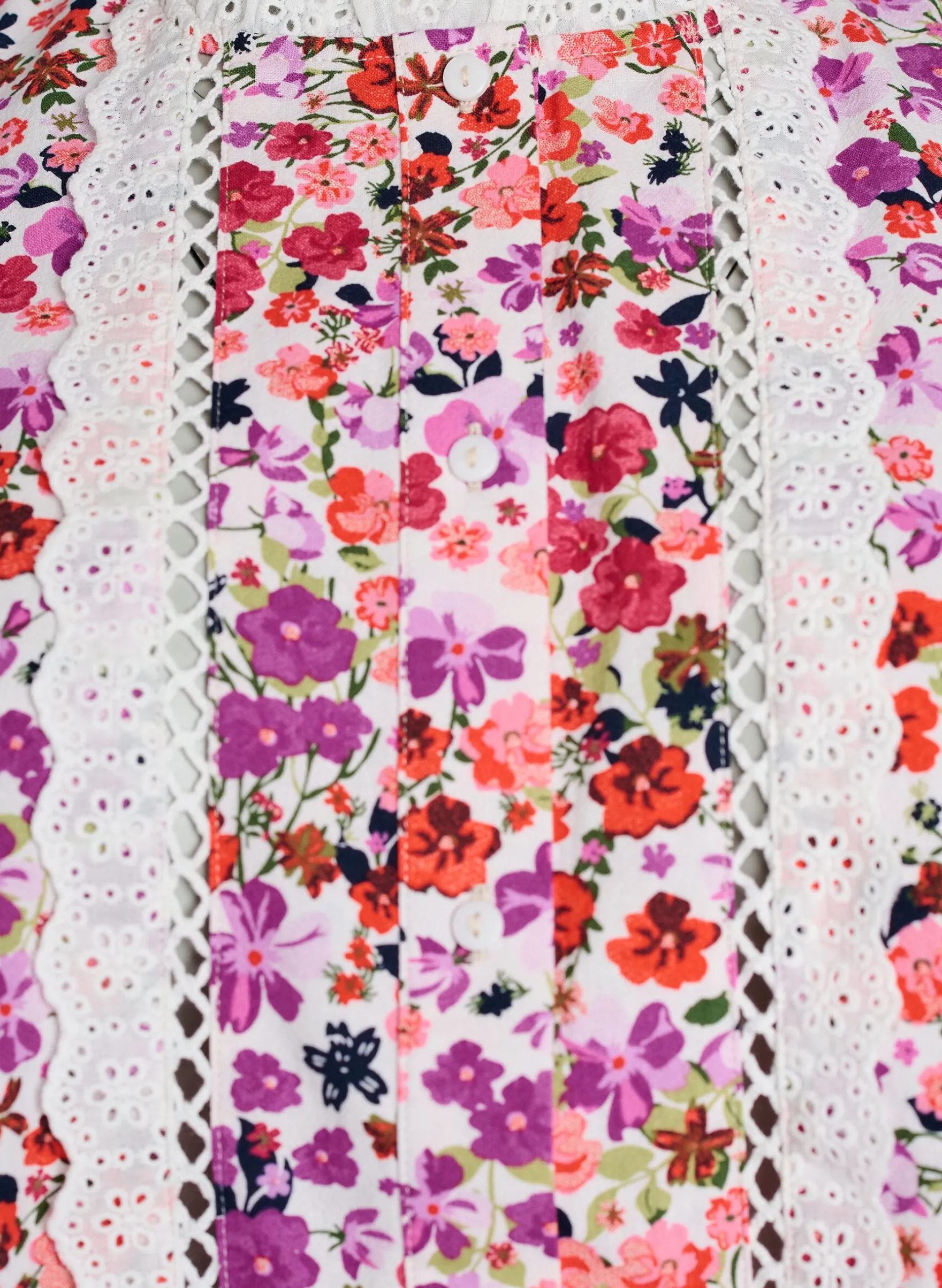 Ärmellose Bluse aus Baumwolle mit Blumenprint und Broderie Anglaise