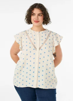 Ärmellose Bluse mit Häkelborte und Rüschendetail