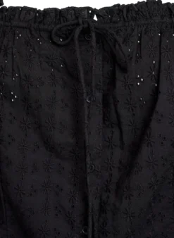 Ärmellose Bluse mit Lochstickerei und Rüschen