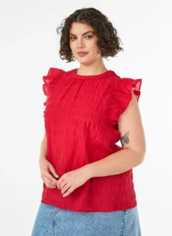 Ärmellose Bluse mit Struktur und Rüschen