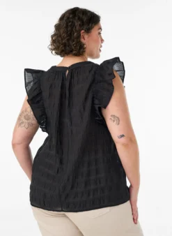 Ärmellose Bluse mit Struktur und Rüschen