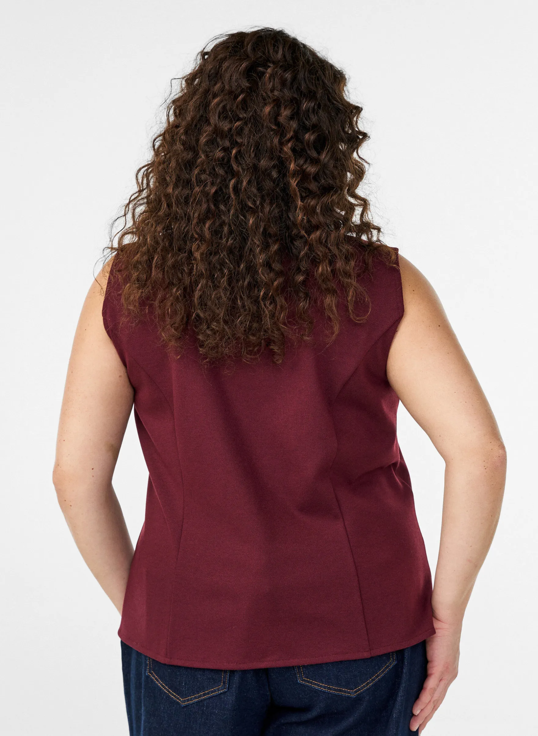 Ärmellose Bluse mit Zierknöpfen