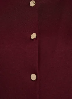 Ärmellose Bluse mit Zierknöpfen