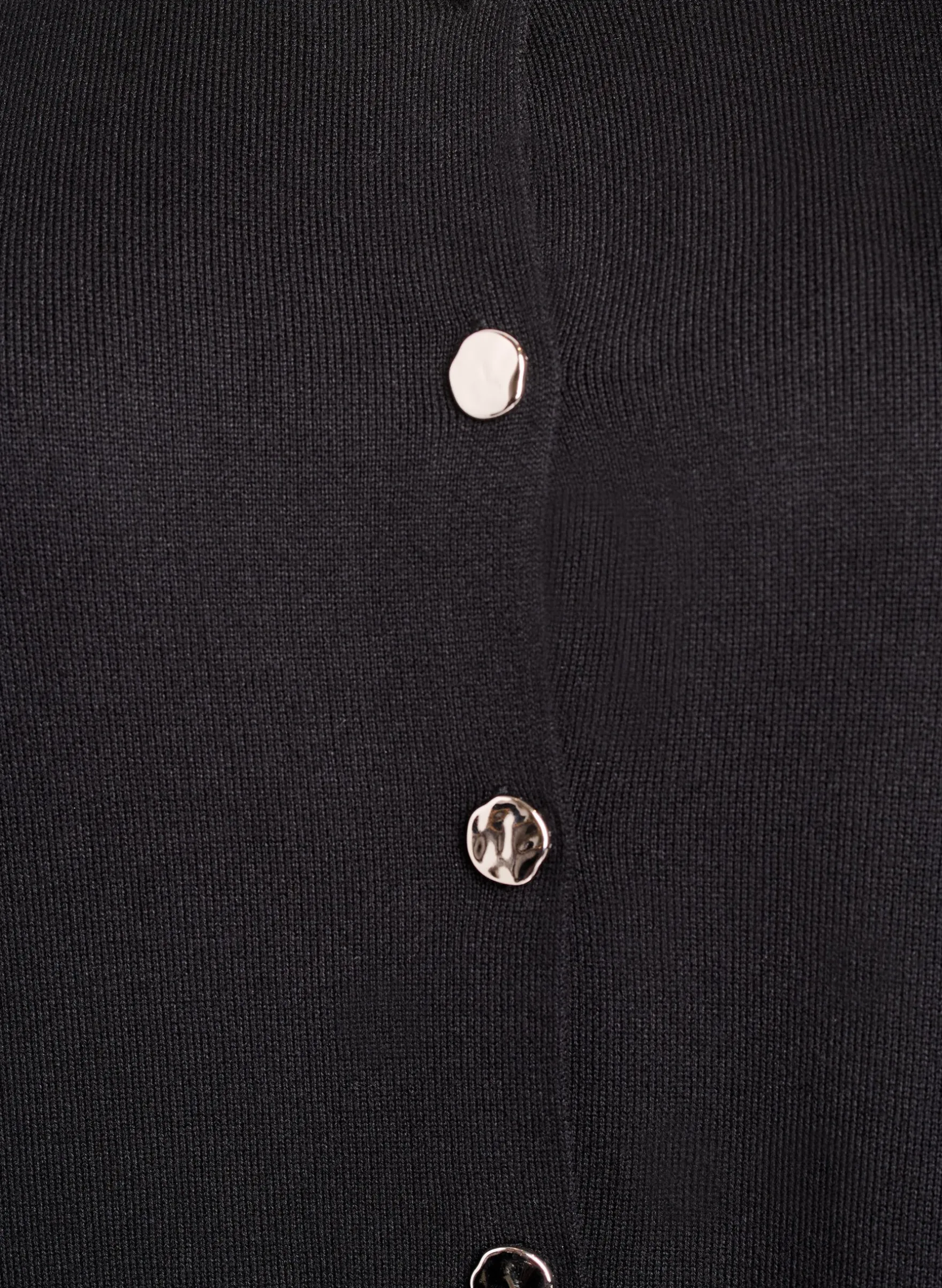 Ärmellose Strickweste mit Zierknöpfen