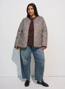 Steppjacke mit kleinem Karomuster und Kontrastbesatz