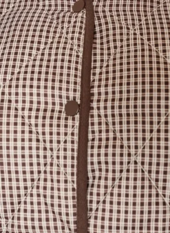 Steppjacke mit kleinem Karomuster und Kontrastbesatz