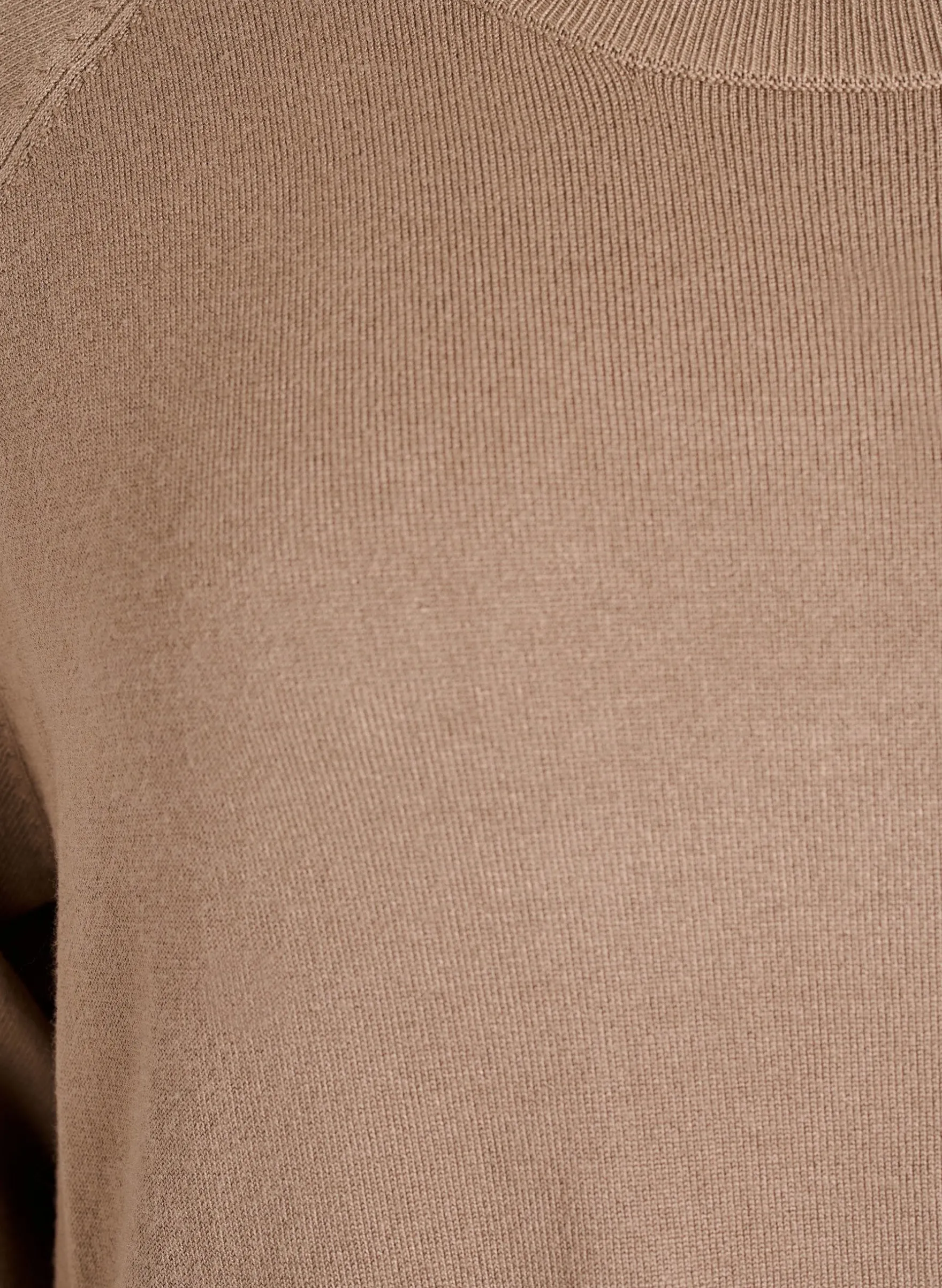 Strickbluse mit seitlichen Knöpfen
