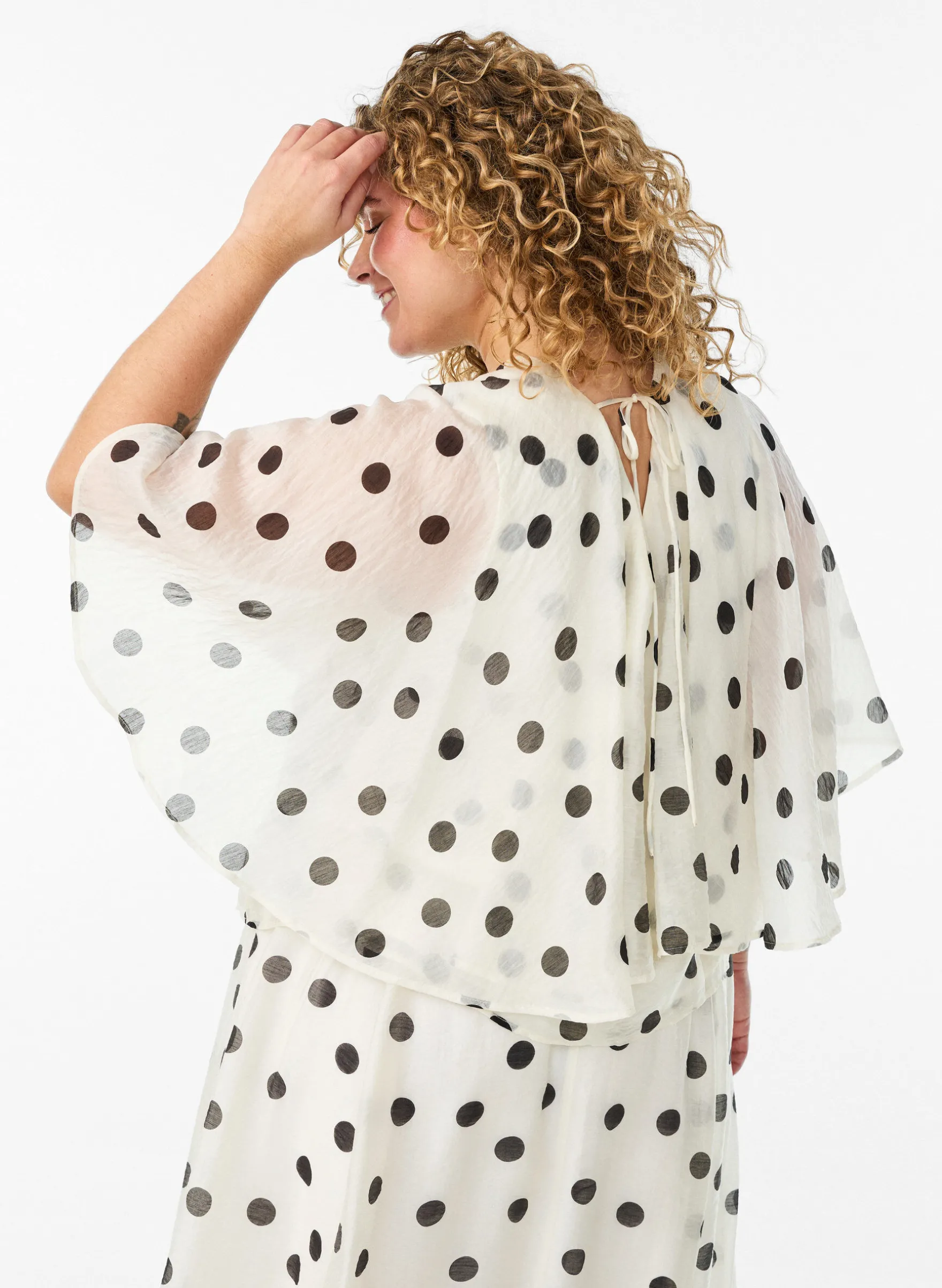 Top im Lagenlook mit Polka-Dot-Muster