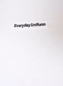 T-Shirt aus Baumwolle mit Text-Badge