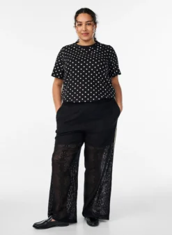 Weite Spitzenhose mit Kontraststreifen